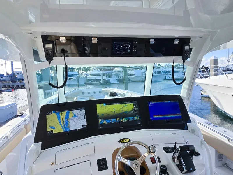 Slide: The Image of 2023 HCB Suenos boat cockpit with advanced navigation systems and luxurious interior. - 29
