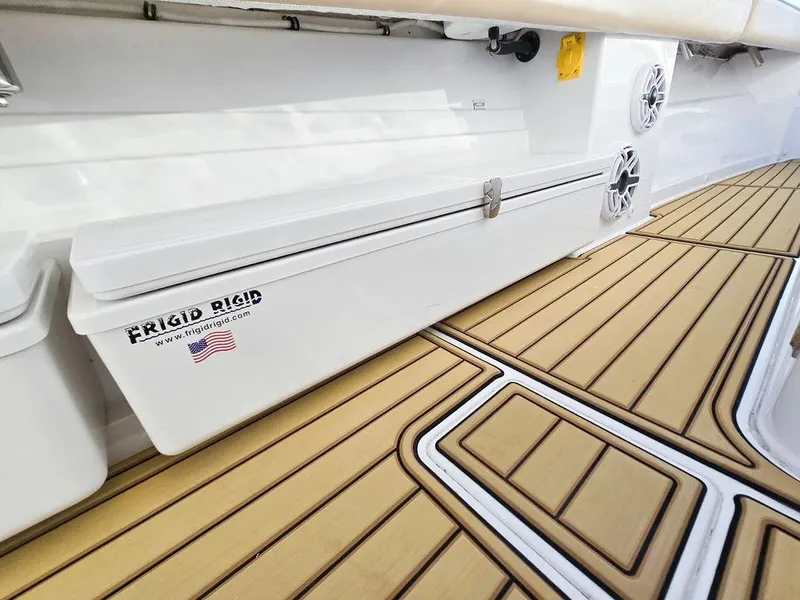 Slide: The Image of 2023 HCB Suenos boat deck with sleek, modern design and wood-like flooring. - 39