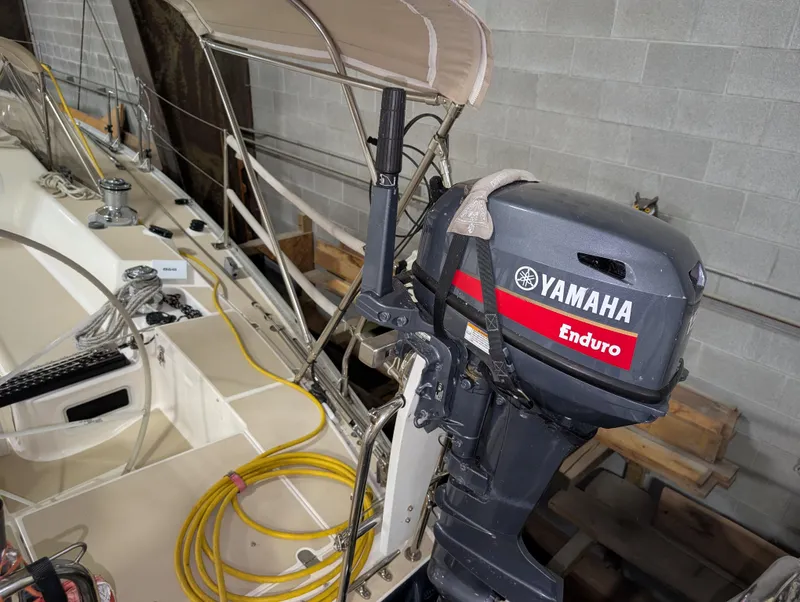 Slide: The Image of 2001 J Boats J/46 sailboat with Yamaha Enduro outboard motor in storage. - 26