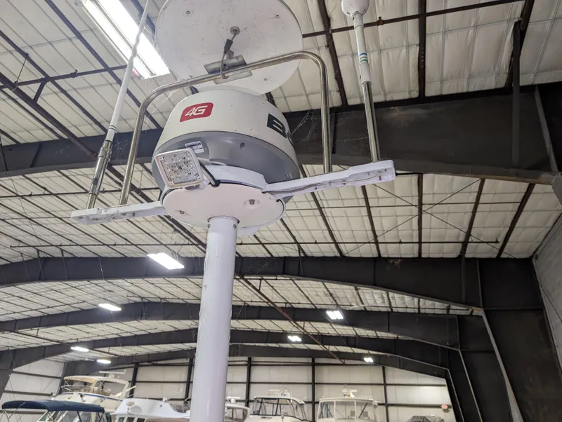 Slide: The Image of Radar equipment on a 2001 J Boats J/46 sailboat in a storage facility. - 28