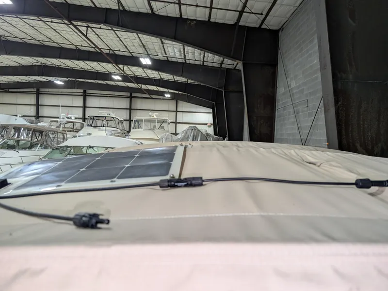 Slide: The Image of 2001 J Boats J/46 sailboat with solar panel in storage facility. - 30