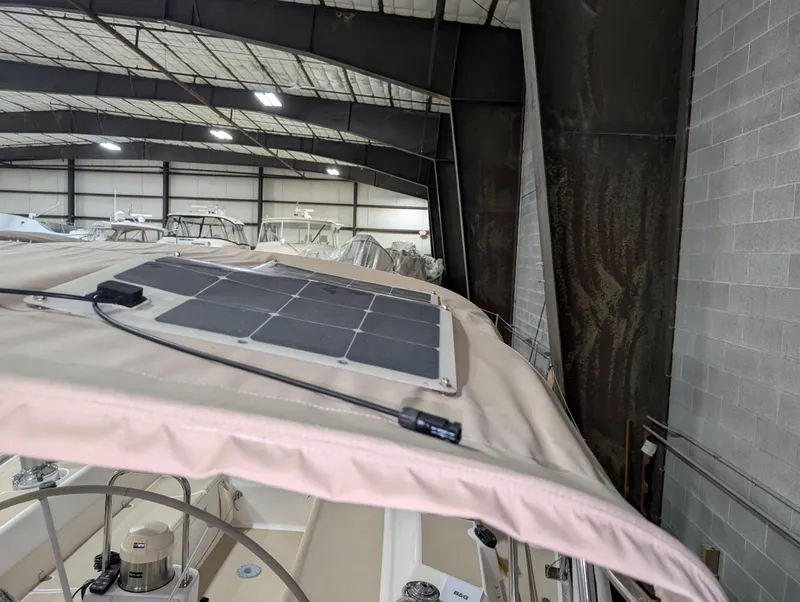 Slide: The Image of 2001 J Boats J/46 with solar panel on deck, stored indoors. - 31