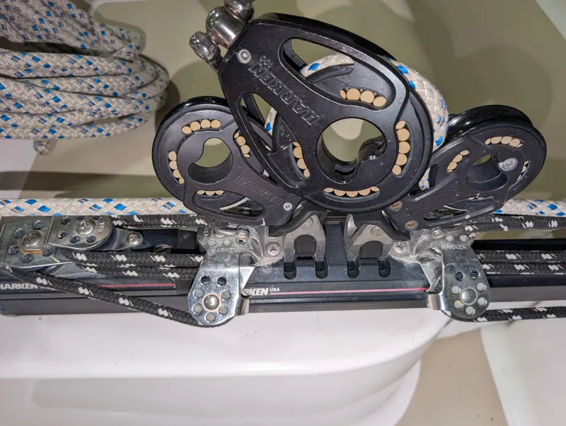 Slide: The Image of Close-up of a 2001 J Boats J/46 sailboat rigging system with Harken blocks. - 45