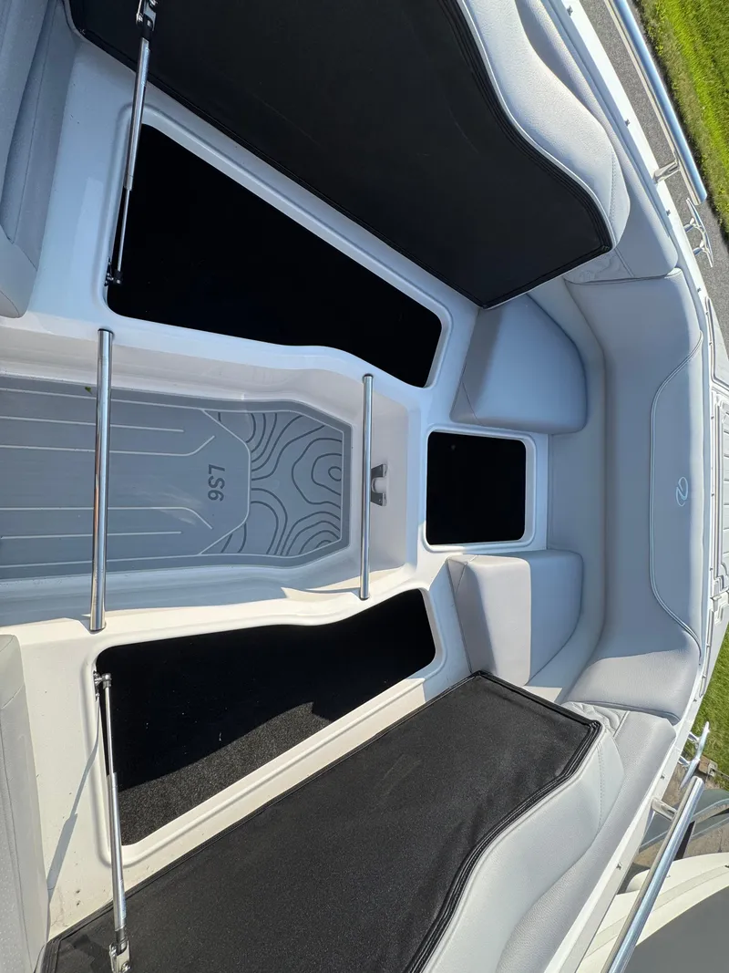 Slide: The Image of 2025 Regal LS9 Surf boat interior with sleek seating and modern design. - 11