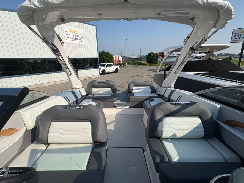 Slide: The Image of 2025 Regal LS9 Surf boat interior with luxurious seating and modern design. - 17