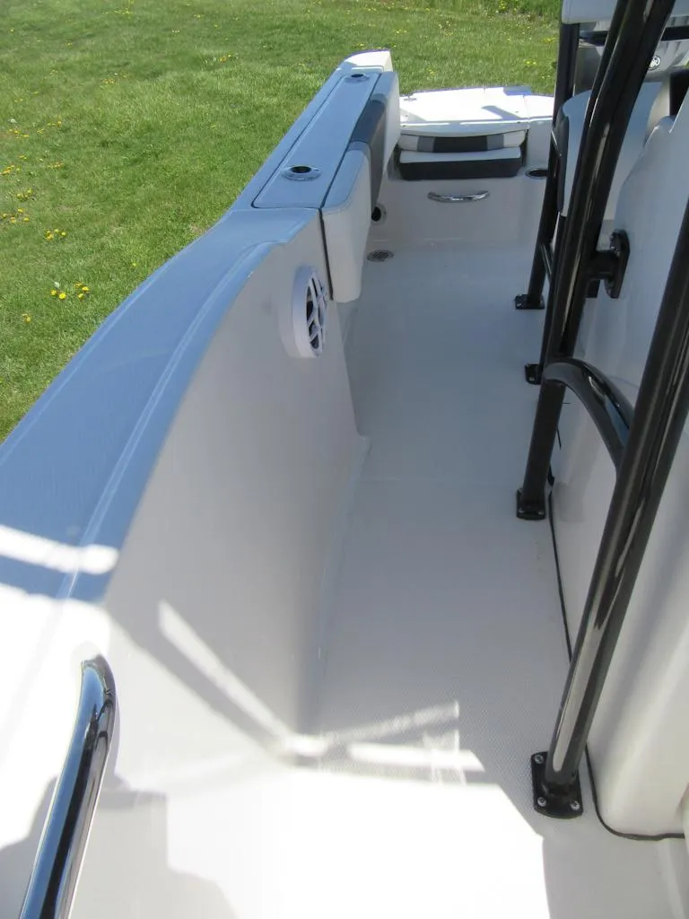 Slide: The Image of 2025 Robalo R180 Center Console boat interior with sleek design and spacious layout. - 10