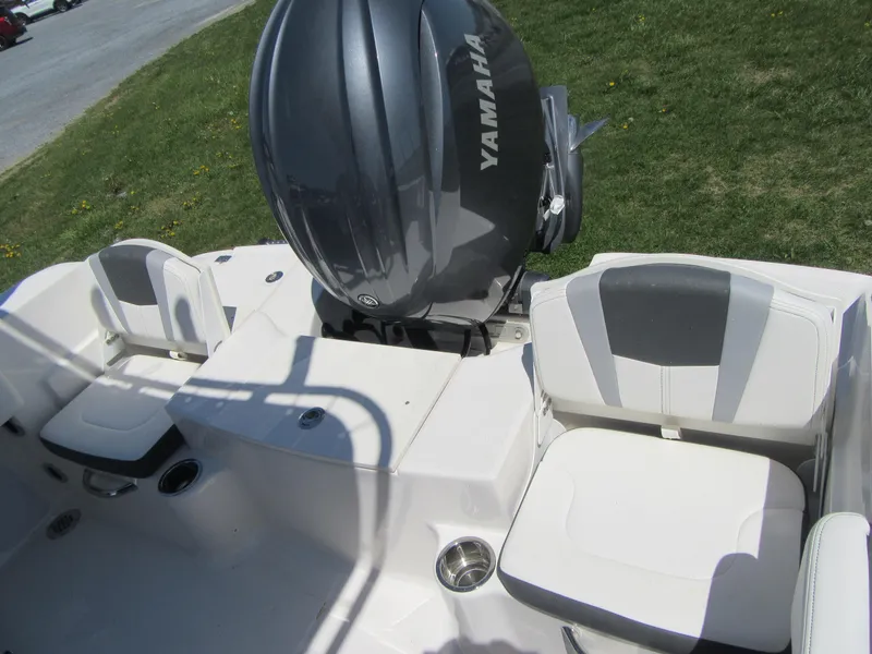 Slide: The Image of 2025 Robalo R180 Center Console boat with Yamaha engine, featuring comfortable seating. - 14