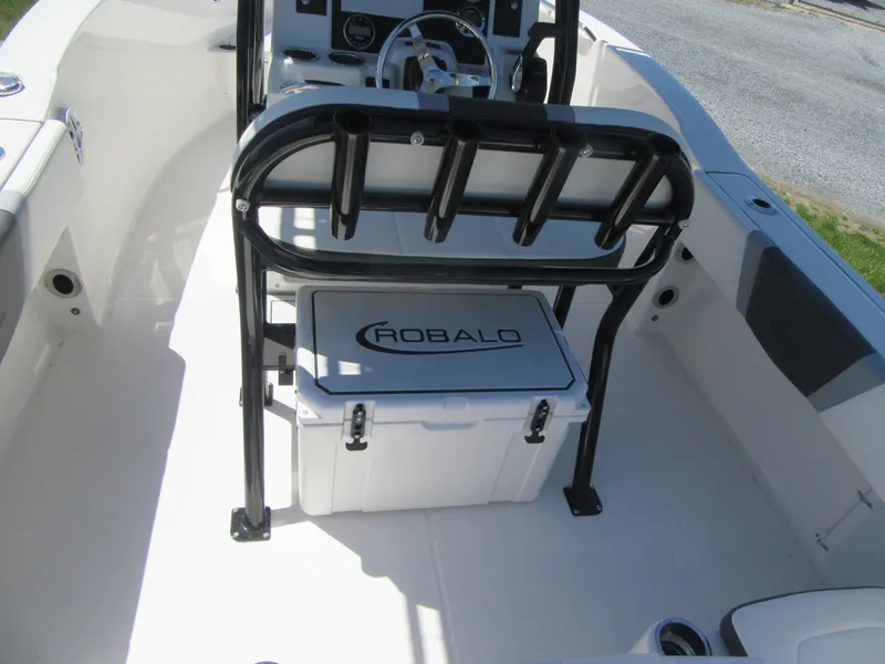 Slide: The Image of 2025 Robalo R180 Center Console boat interior with seating and storage. - 15