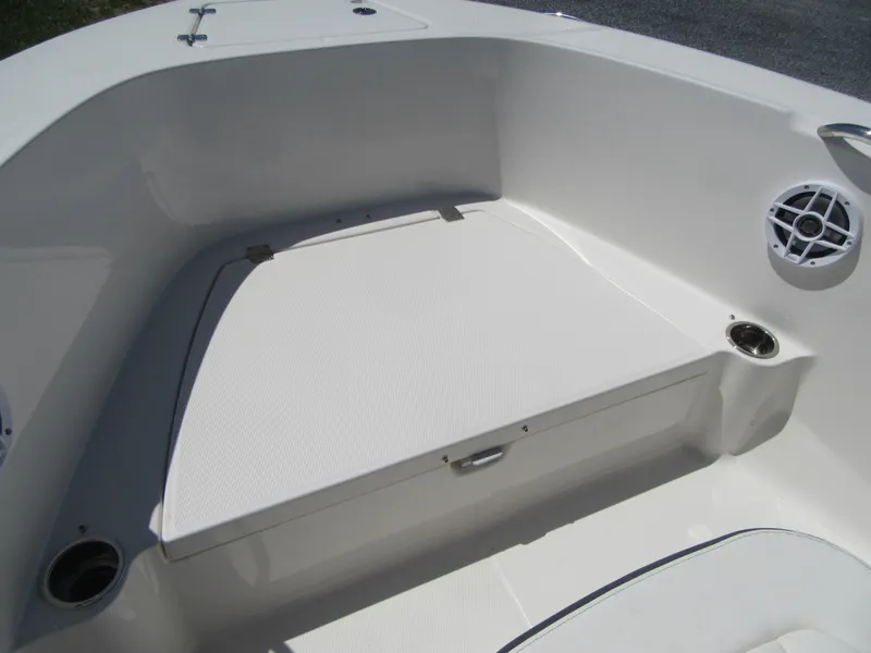 Slide: The Image of 2025 Robalo R180 Center Console boat interior with seating and storage. - 5