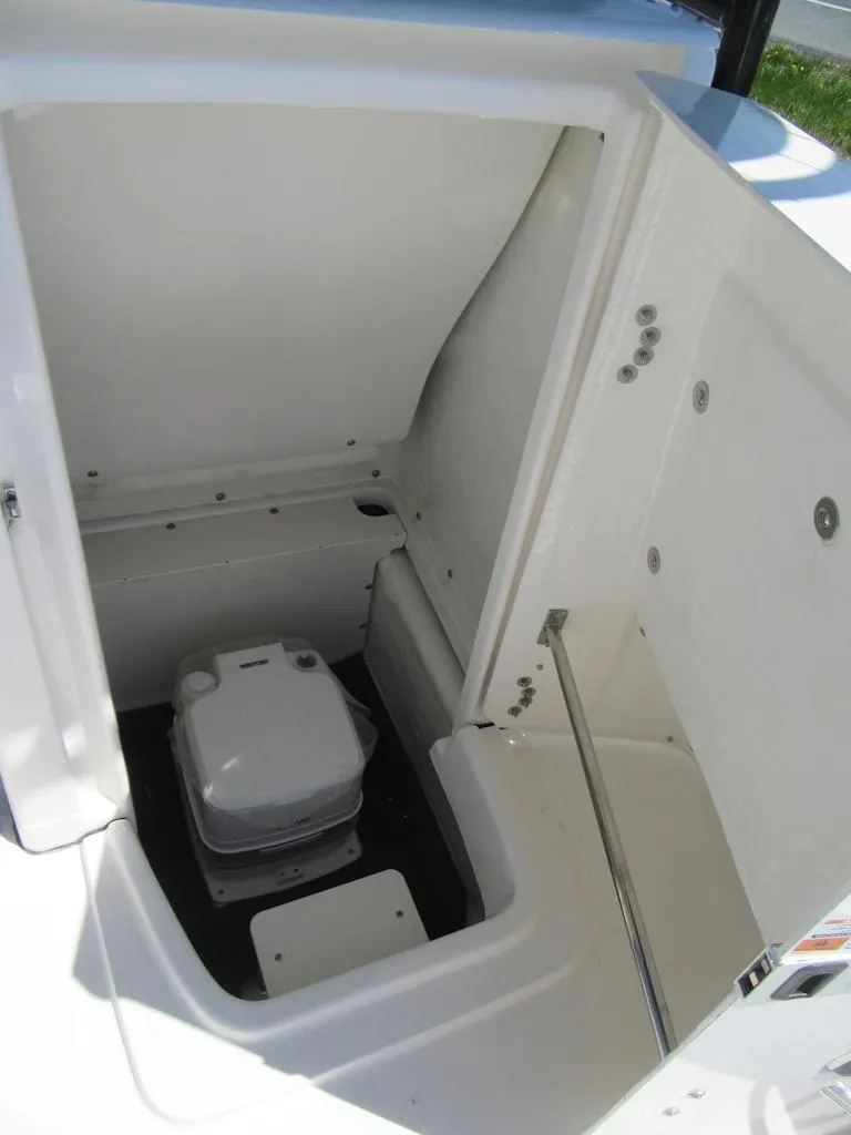 Slide: The Image of 2025 Robalo R180 Center Console boat interior storage compartment. - 8