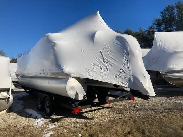 Slide: The Image of 2023 Sun Tracker PB 22 RF pontoon boat covered in protective wrap. - 4