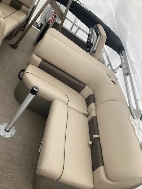 Slide: The Image of 2023 Sun Tracker PB 22 RF pontoon boat with beige seating and modern design. - 6