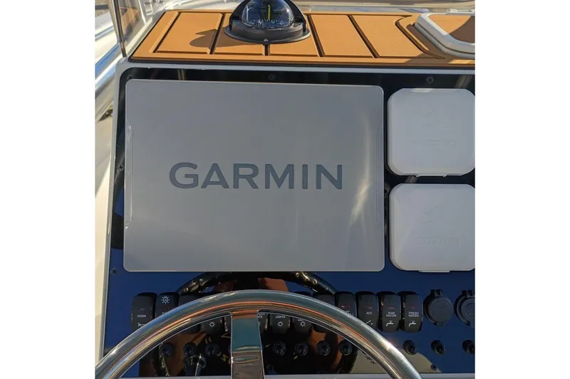 Slide: The Image of 2026 Bulls Bay 255 Center Console with Garmin navigation system. - 14