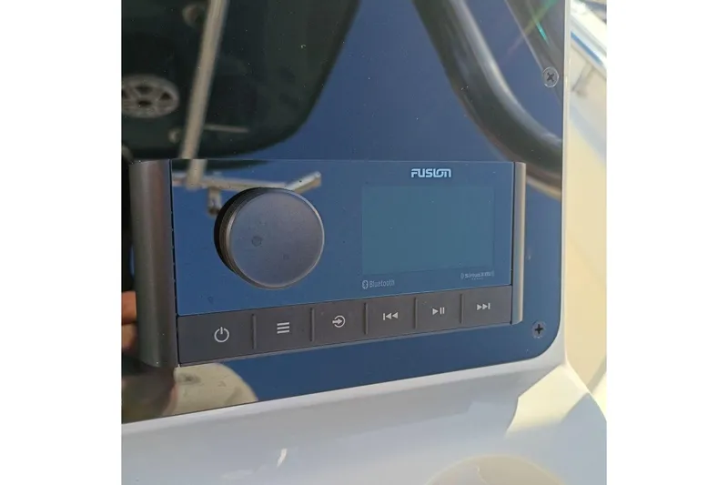 Slide: The Image of Fusion audio system on 2026 Bulls Bay 255 Center Console boat dashboard. - 16