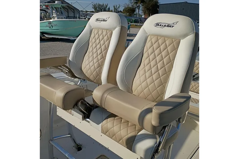 Slide: The Image of 2026 Bulls Bay 255 Center Console boat seats with diamond-stitched upholstery. - 26