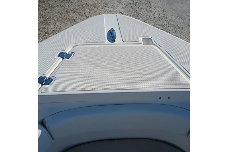 Slide: The Image of 2026 Bulls Bay 255 Center Console boat deck with storage compartment and sleek design. - 34