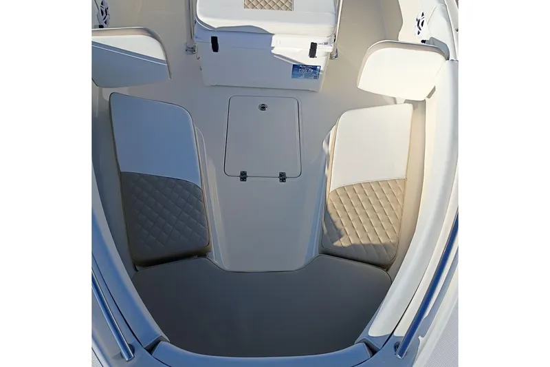 Slide: The Image of 2026 Bulls Bay 255 Center Console boat interior with cushioned seating and storage. - 35