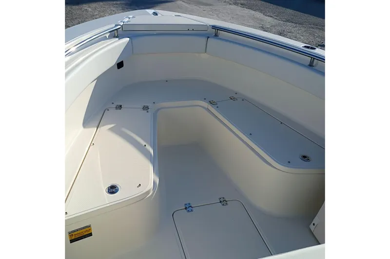 Slide: The Image of 2026 Bulls Bay 255 Center Console boat interior with spacious seating and storage compartments. - 45