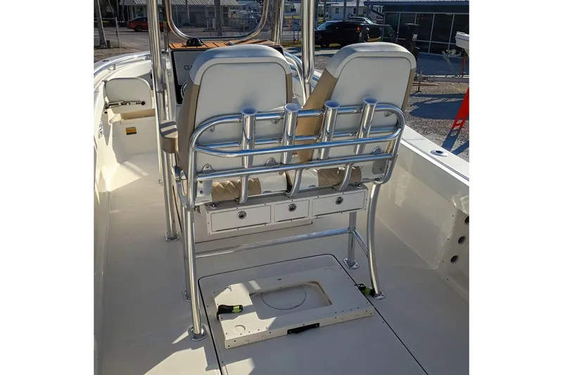 Slide: The Image of 2026 Bulls Bay 255 Center Console boat interior with seating and rod holders. - 8