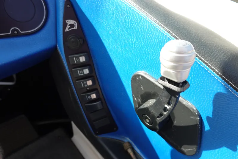 Slide: The Image of Centurion Enzo SV230 Plus 2013 interior controls with blue upholstery and gear lever. - 15