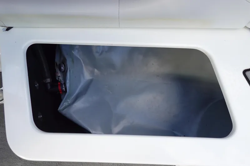Slide: The Image of Storage compartment of 2013 Centurion Enzo SV230 Plus boat. - 22
