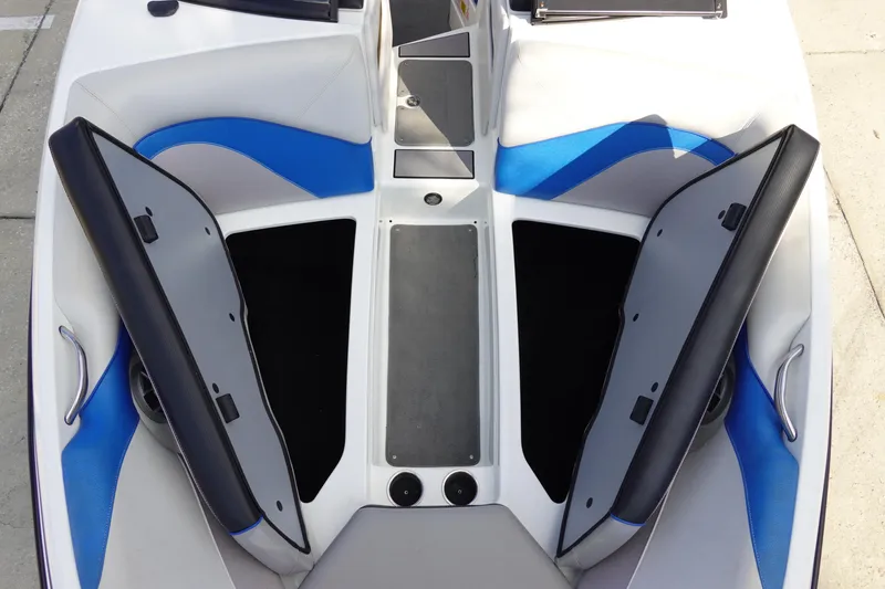 Slide: The Image of 2013 Centurion Enzo SV230 Plus boat interior with open storage compartments. - 27