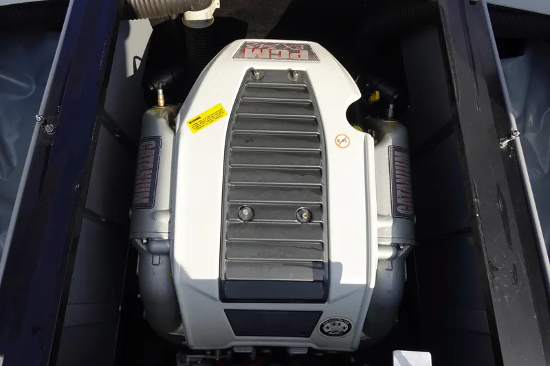 Slide: The Image of 2013 Centurion Enzo SV230 Plus engine compartment, featuring a powerful inboard motor. - 33