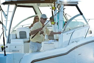 Slide: The Image of 2025 Boston Whaler 285 Conquest with people fishing onboard. - 6