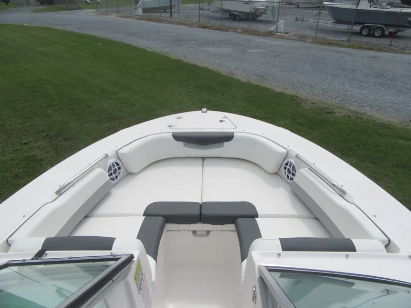 Slide: The Image of 2025 Robalo R207 Dual Console boat with spacious seating and sleek design. - 4
