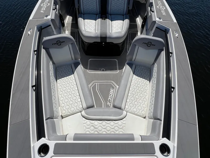 Slide: The Image of 2023 Fountain 38 SCX boat interior with luxurious seating and modern design. - 11