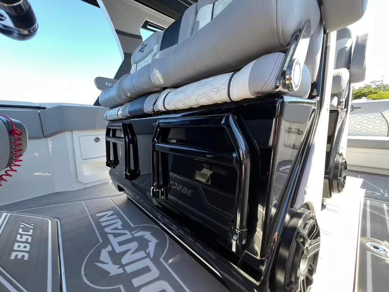 Slide: The Image of 2023 Fountain 38 SCX boat interior with sleek seating and modern design. - 21