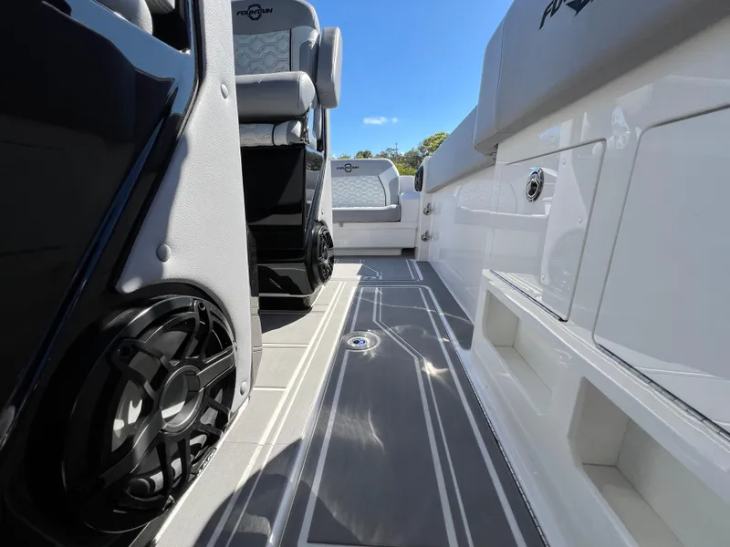 Slide: The Image of 2023 Fountain 38 SCX boat interior with sleek seating and modern design. - 22