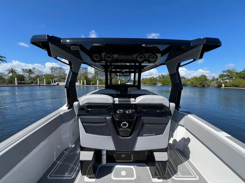 Slide: The Image of 2023 Fountain 38 SCX boat interior with sleek design on a sunny day. - 27
