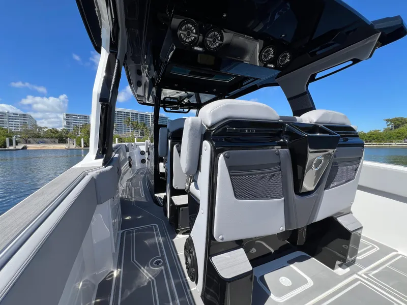 Slide: The Image of 2023 Fountain 38 SCX boat interior with modern seating and sleek design. - 30