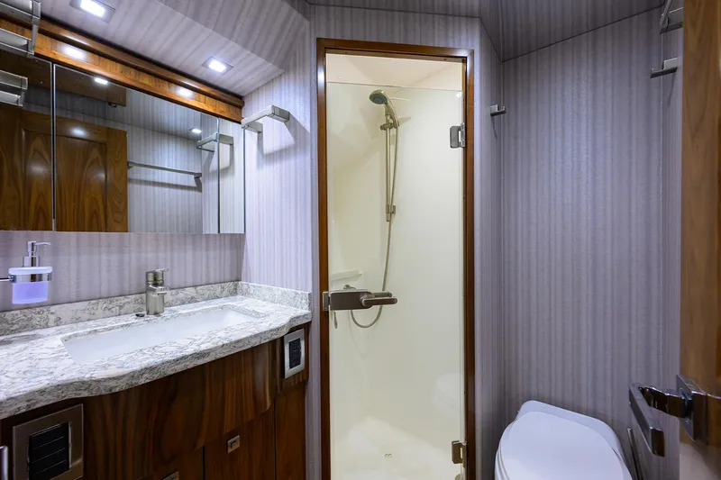 Slide: The Image of Viking 80 LAMPLIGHTER -  Mid Starboard Guest Head - 28