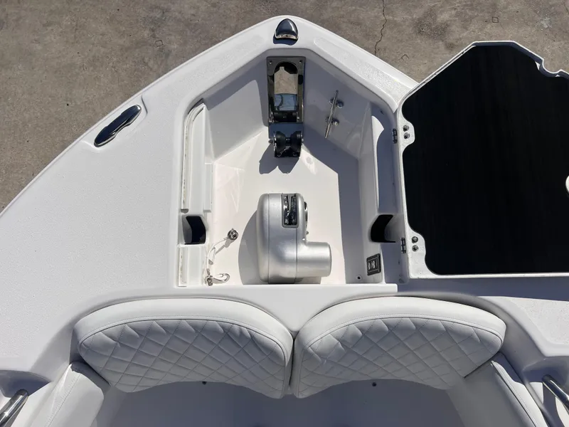 Slide: The Image of 2025 Sea Fox 248 Commander boat bow with seating and anchor storage. - 15