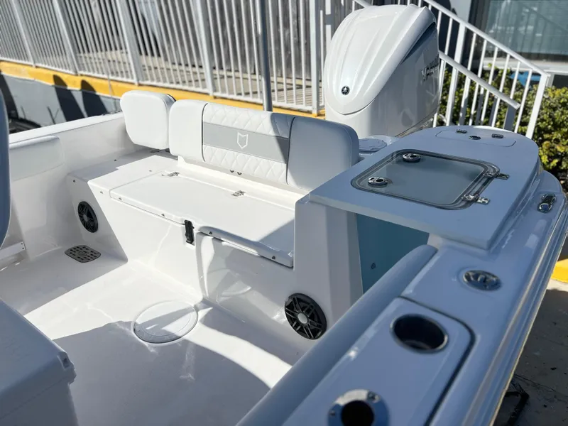 Slide: The Image of 2025 Sea Fox 248 Commander boat interior with seating and storage features. - 39