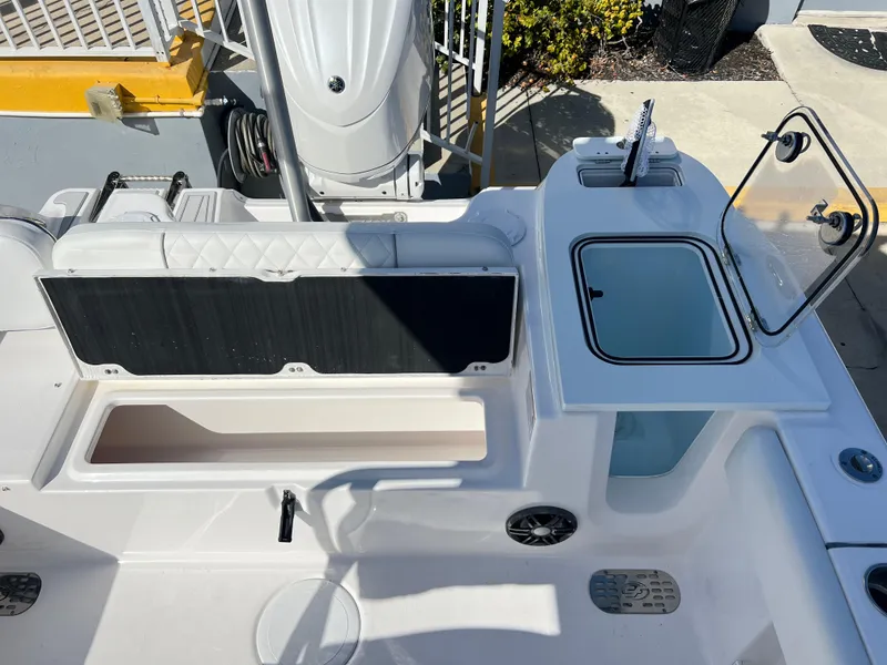 Slide: The Image of 2025 Sea Fox 248 Commander boat interior with storage and seating area. - 42