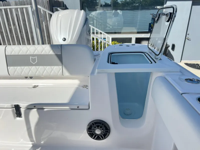 Slide: The Image of 2025 Sea Fox 248 Commander boat interior with seating and storage compartments. - 44
