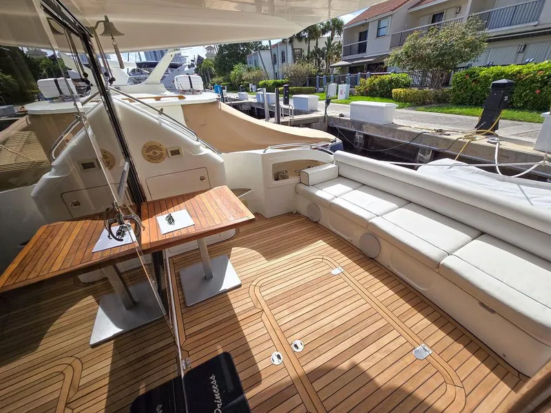 Slide: The Image of Luxurious 1998 Viking Princess 56 Sport Cruiser with elegant teak deck and comfortable seating. - 17