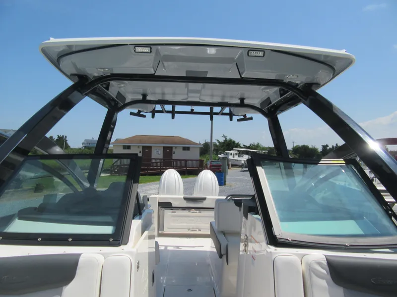 Slide: The Image of 2025 Robalo R257 Dual Console boat interior with sleek design and spacious seating. - 12