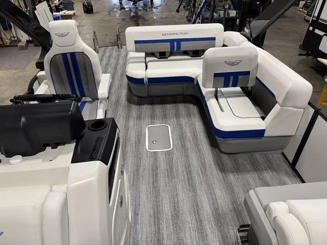 Slide: The Image of 2025 Bennington M Swingback 26 MSB interior with stylish seating and modern design. - 11