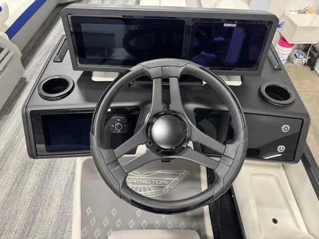 Slide: The Image of Steering console of 2025 Bennington M Swingback 26 MSB with dual Simrad displays. - 18