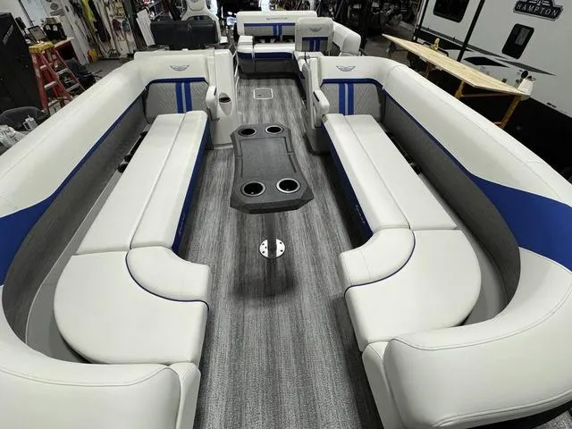 Slide: The Image of 2025 Bennington M Swingback 26 MSB pontoon boat interior with spacious seating and modern design. - 21