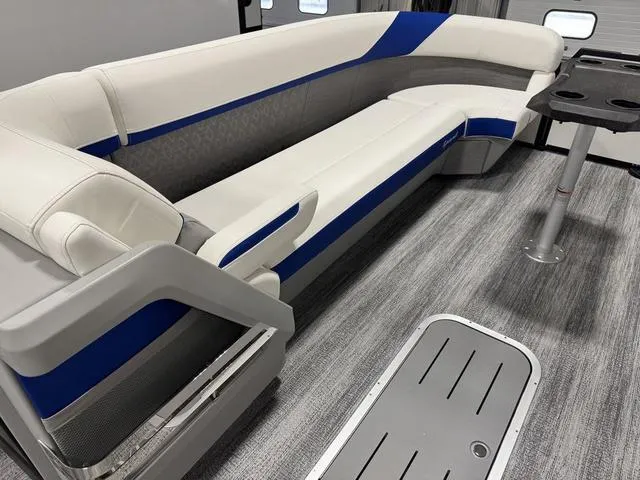 Slide: The Image of Luxurious seating on 2025 Bennington M Swingback 26 MSB pontoon boat interior. - 22