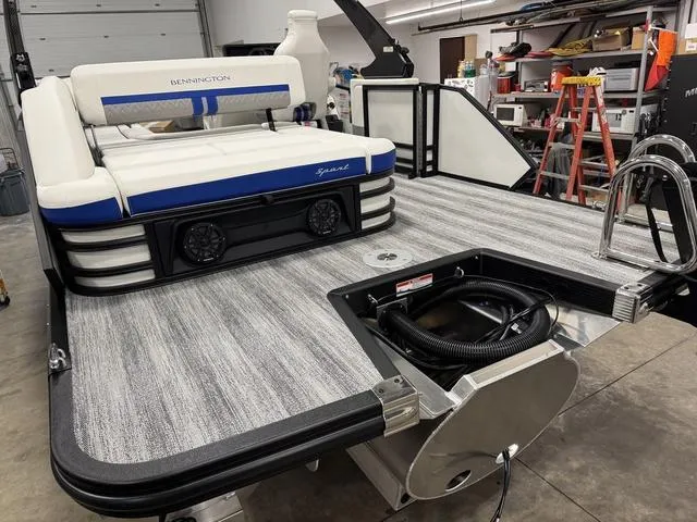 Slide: The Image of 2025 Bennington M Swingback 26 MSB pontoon boat with spacious deck and seating. - 7