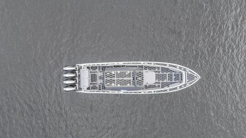 Slide: The Image of Aerial view of 2024 Nor-Tech 392 Super Fish boat on water. - 2