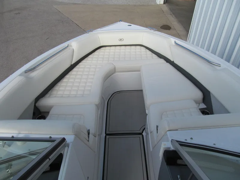 Slide: The Image of 2019 Cobalt R7 Surf boat with spacious white seating area. - 15