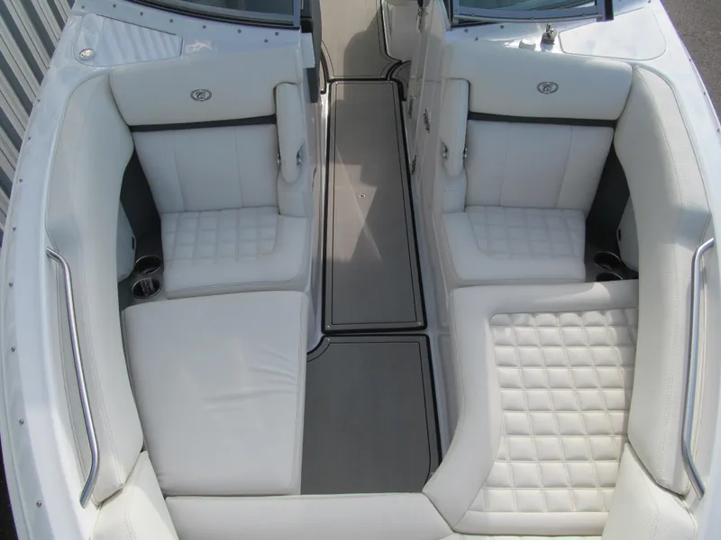 Slide: The Image of 2019 Cobalt R7 Surf boat interior with white cushioned seating. - 16