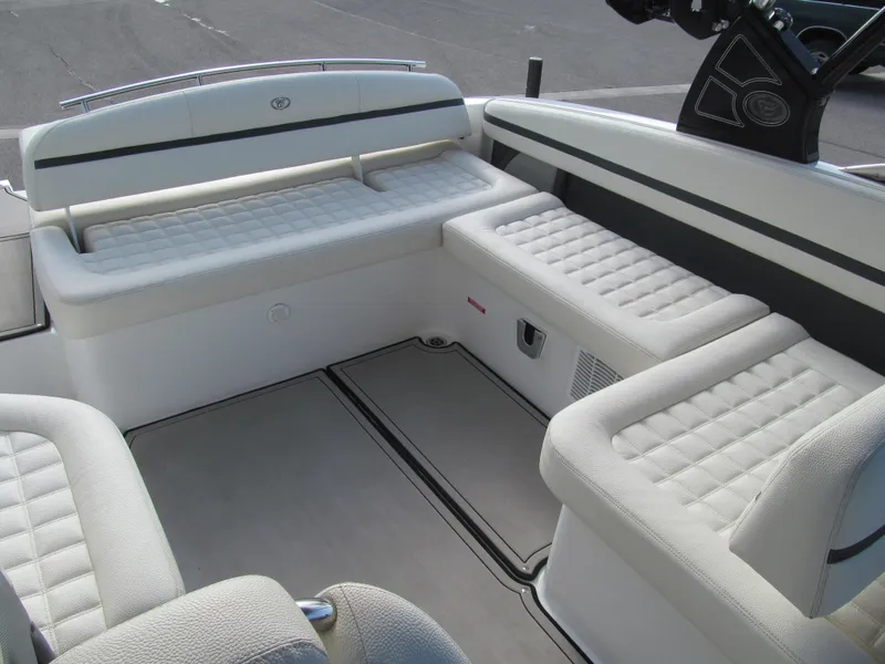 Slide: The Image of 2019 Cobalt R7 Surf boat interior with white cushioned seating. - 20